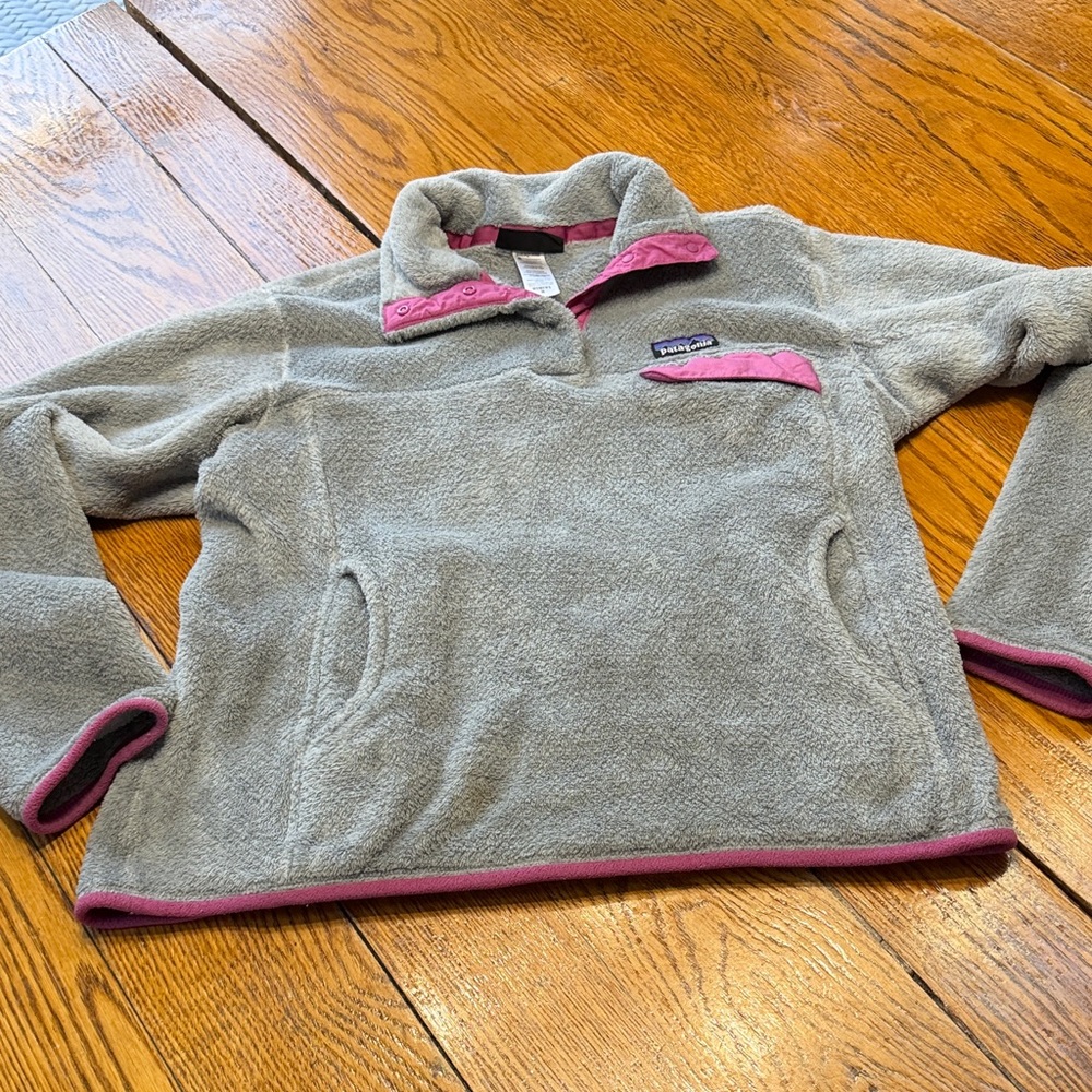Patagonia fleece snap front pullover.  Gray with raspberry trim. Medium.